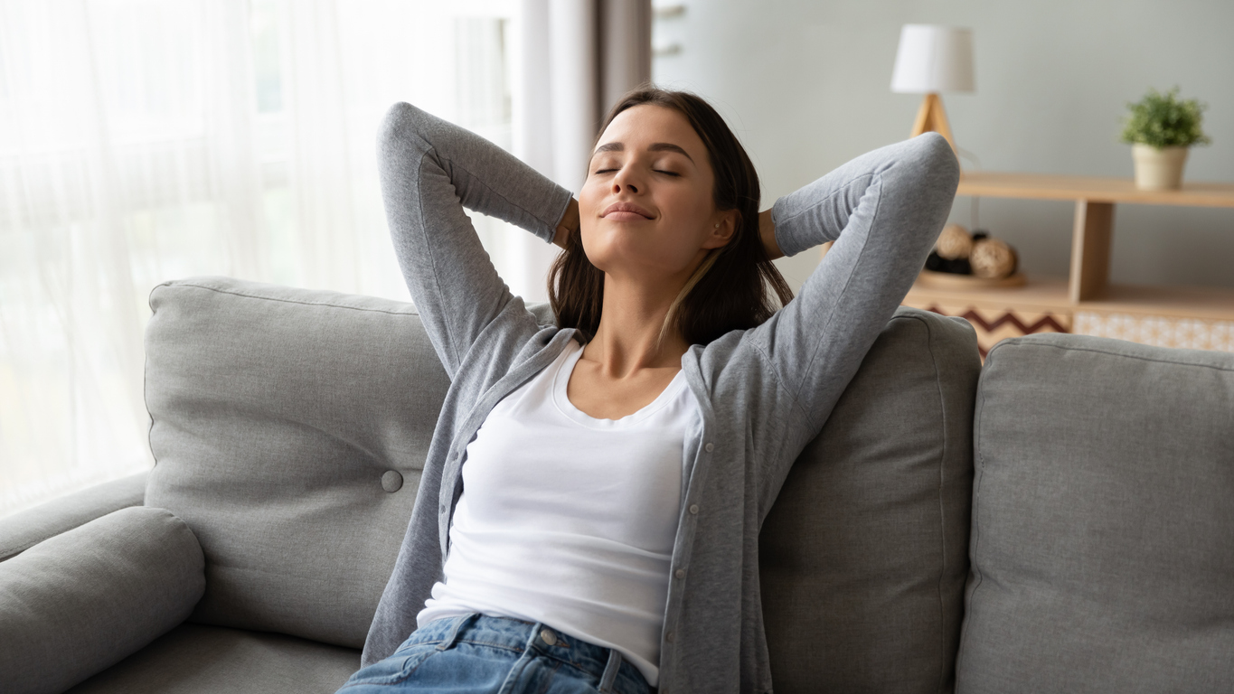 Woman at home at peace after DBT session in Virginia Beach, VA